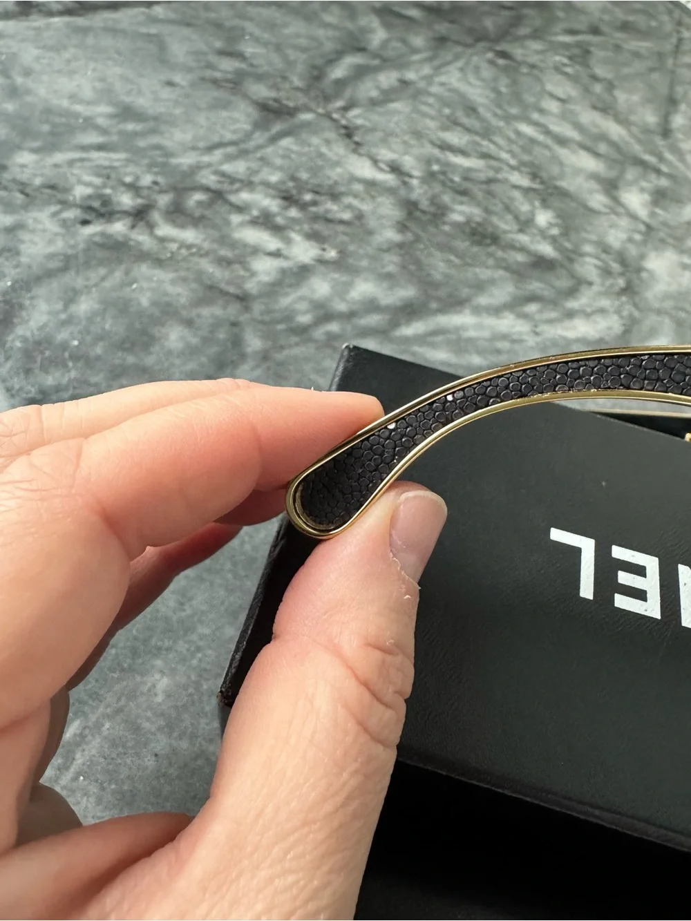 CHANEL Black Sunglasses with Gold Logo Accent